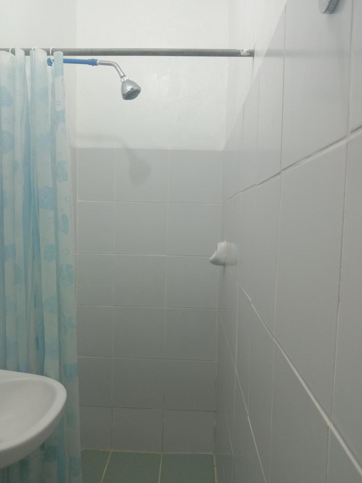 Bucana Beachfront Guesthouse เอลนิโด ห้อง รูปภาพ